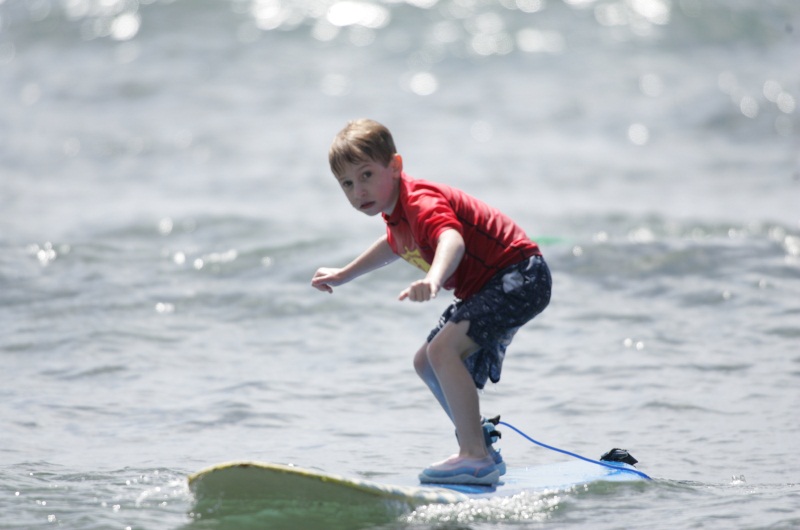 Learning to surf with kids in Bali